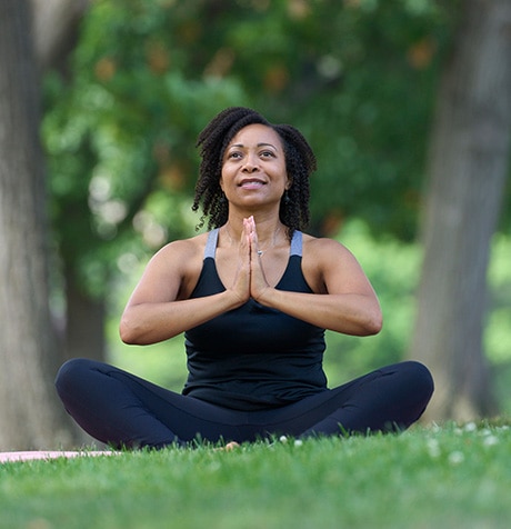 Crystal practicing yoga.