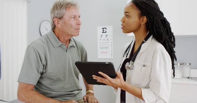 A patient talking with a doctor