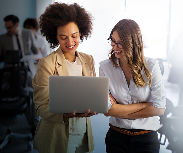 Business Team Looking at Laptop