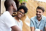 Diverse young adults at coffee shop