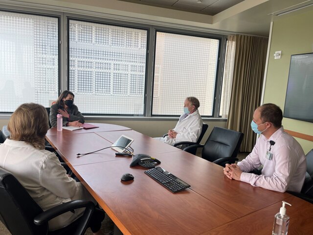 Regional Director Ulrey, Dr. John Hunter, OHSU Health CEO, Dr. Renee Edwards, OHSU Chief Medical Officer, and Peter Graven, OHSU Office of Advanced Analytics Director, discussing current hospital trends and needs.