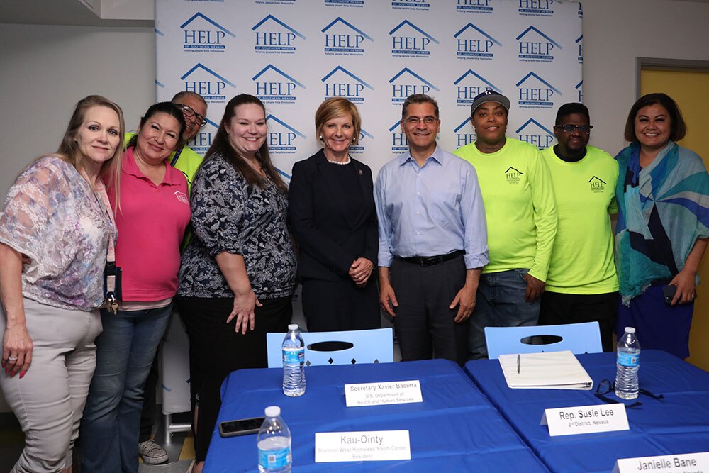 Group picture of meeting attendees with Secretary Becerra at HELP of Southern Nevada