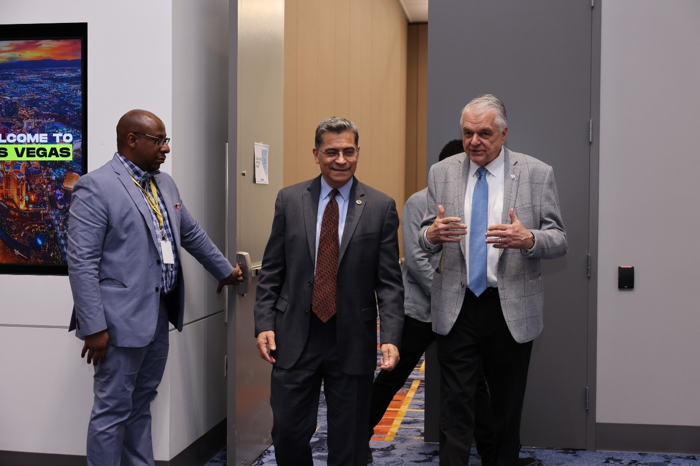 HHS Secretary Becerra walking with Nevada Governor Steve Sisolak at the Nevada Healthcare Provider Summit