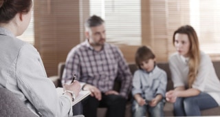 Family talking with therapist