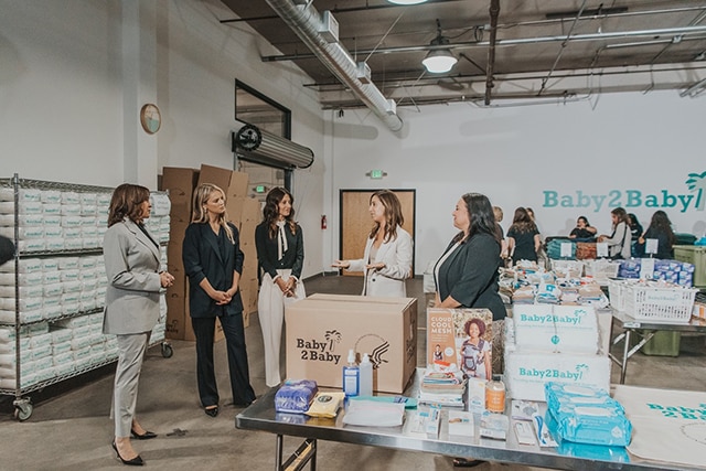 Vice President Kamala Harris, Assistant Secretary for the Administration for Children and Families January Contreras, and Baby2Baby CEOs Norah Weinstein and Kelly Patricof Sawyer tours the Baby2Baby distribution center.